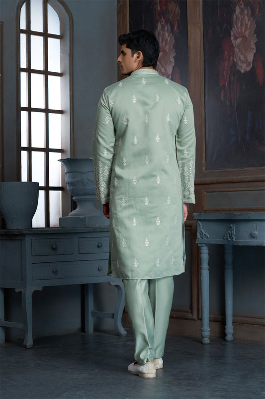 Pista Green cotton Kurta Pyjama with Thread Embroidery and Motifs