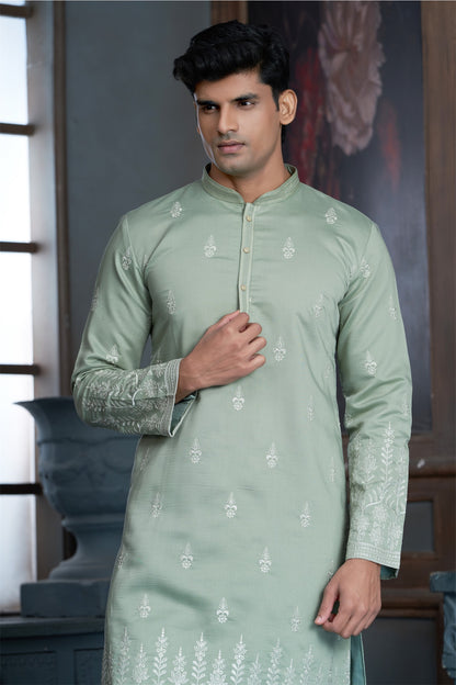 Pista Green cotton Kurta Pyjama with Thread Embroidery and Motifs